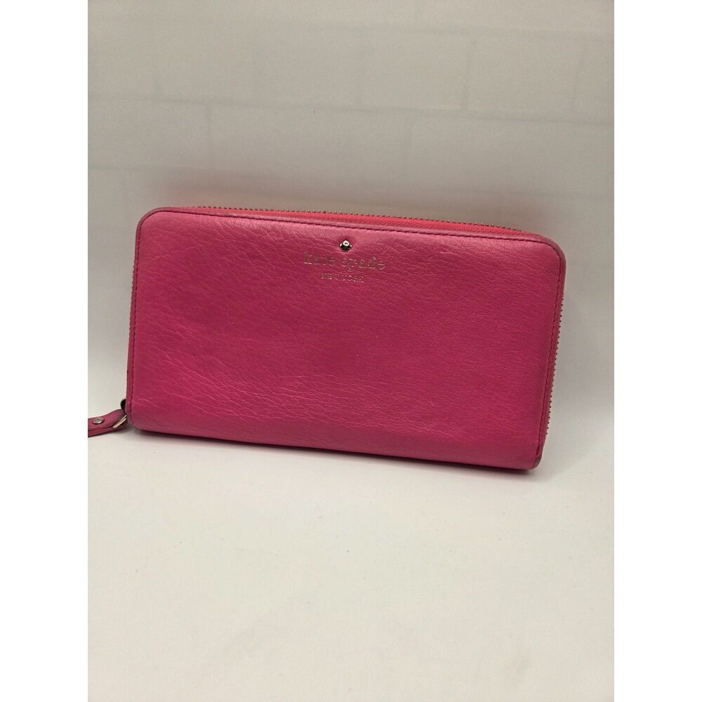 P125. Kate Spade Hot Pink Pebbled Leather Zip Around Wallet